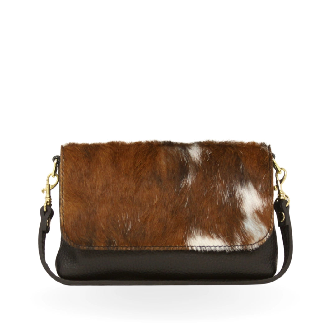 COWHIDE CROSSBODY AND CLUTCH